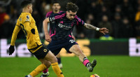 Forest tame Wolves to keep Premier League title hopes alive