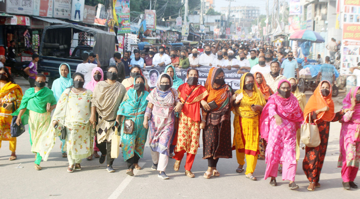 দিনাজপুরে মুখে কালো কাপড় বেঁধে বিএনপির মিছিল